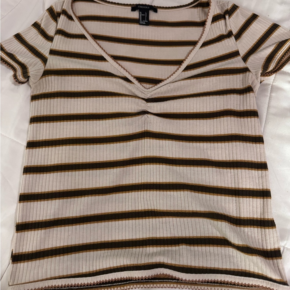 beige brown green striped shirt v neck